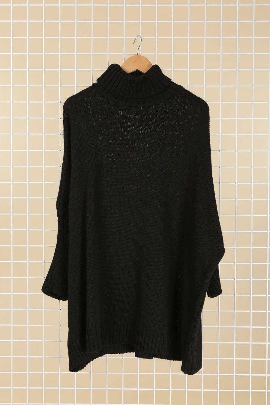 Pull col roulé en grosse maille