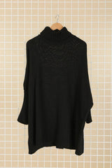 Pull col roulé en grosse maille