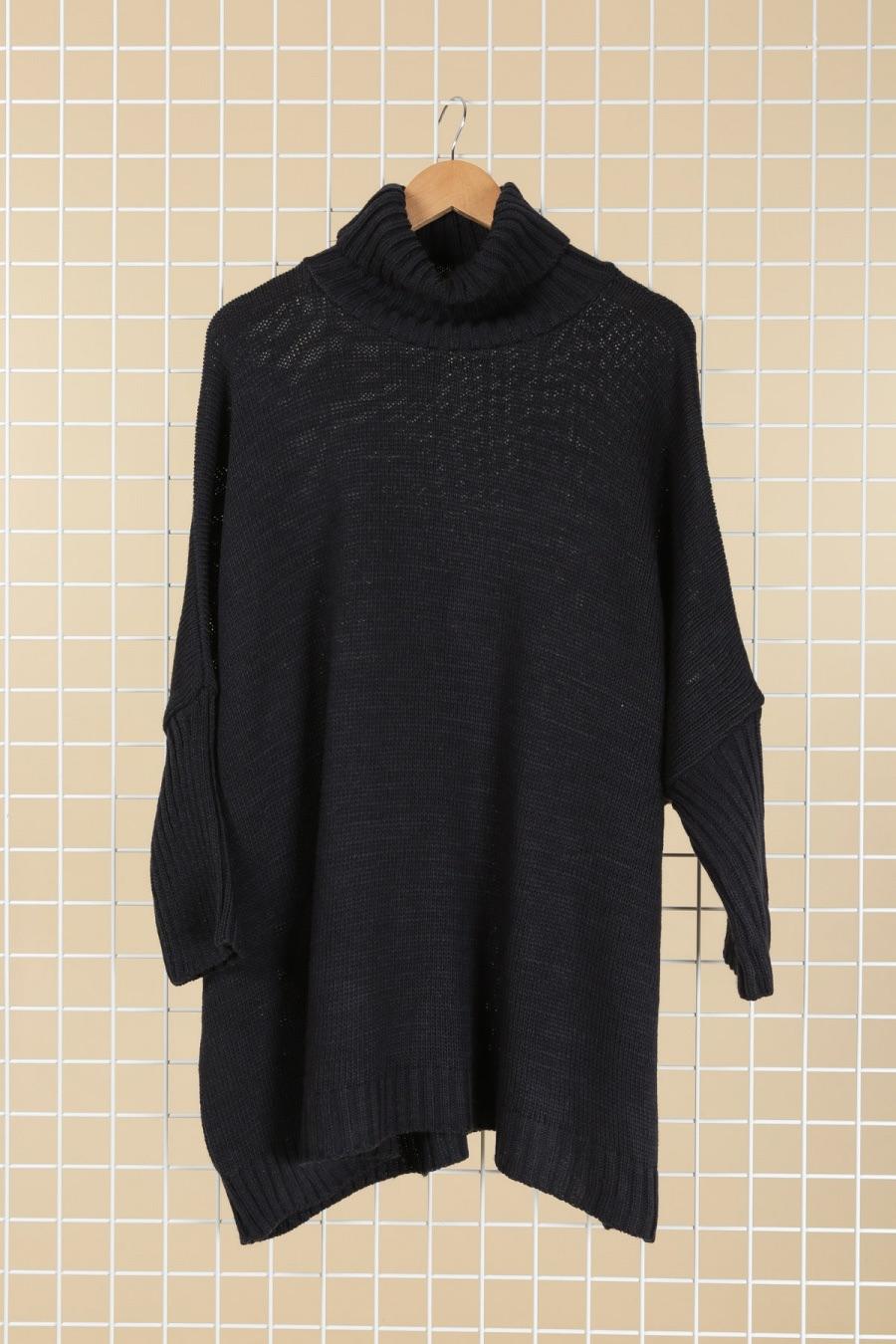 Pull col roulé en grosse maille