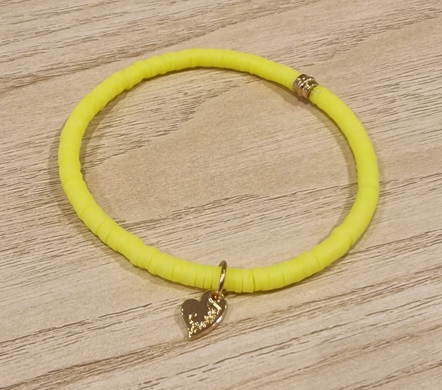 Bracelet élastiqué perles plates en polymère petites - Jaune Fluo