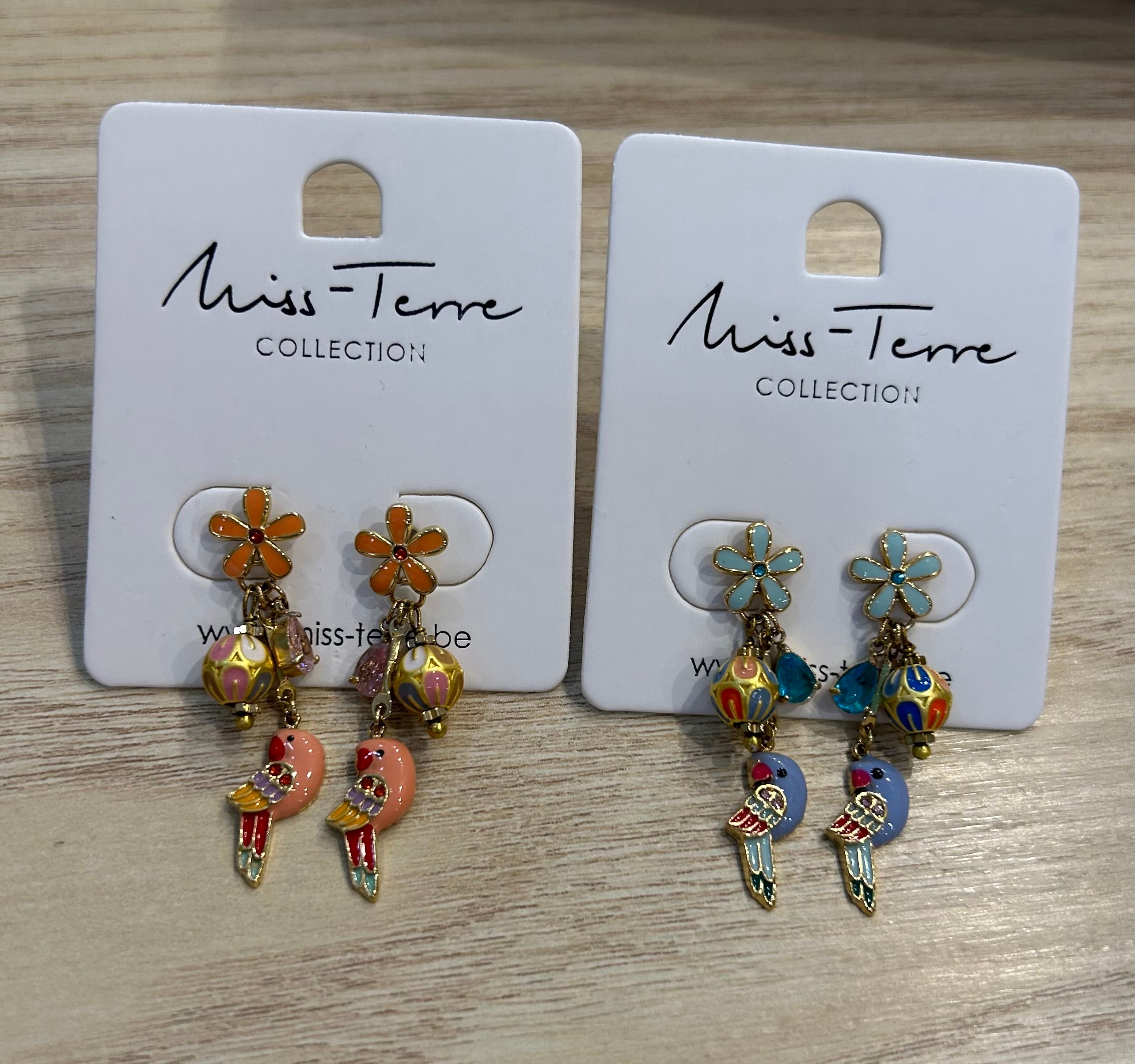 Boucles d'oreilles petite fleur et perroquet