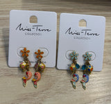 Boucles d'oreilles petite fleur et perroquet