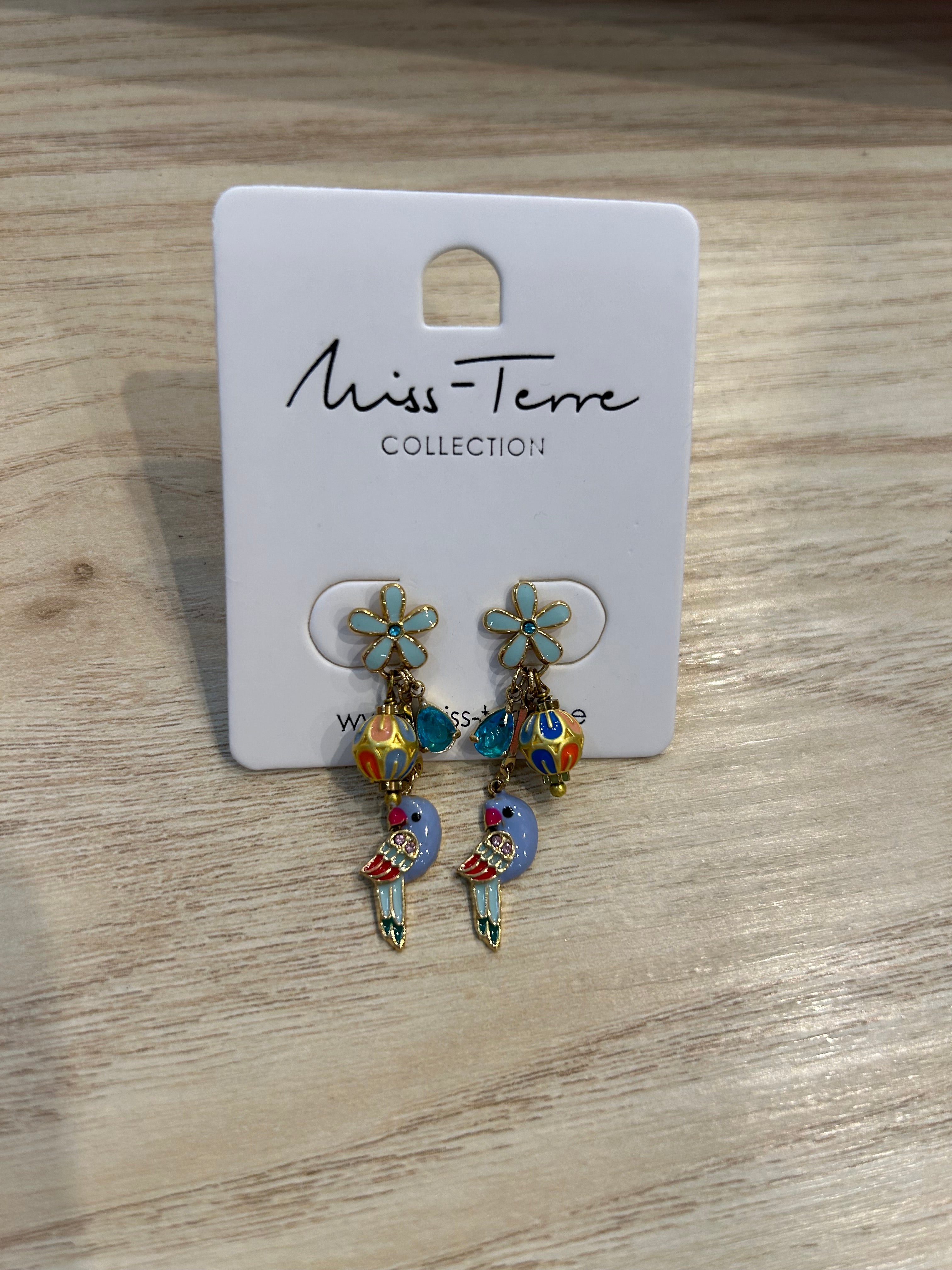 Boucles d'oreilles petite fleur et perroquet