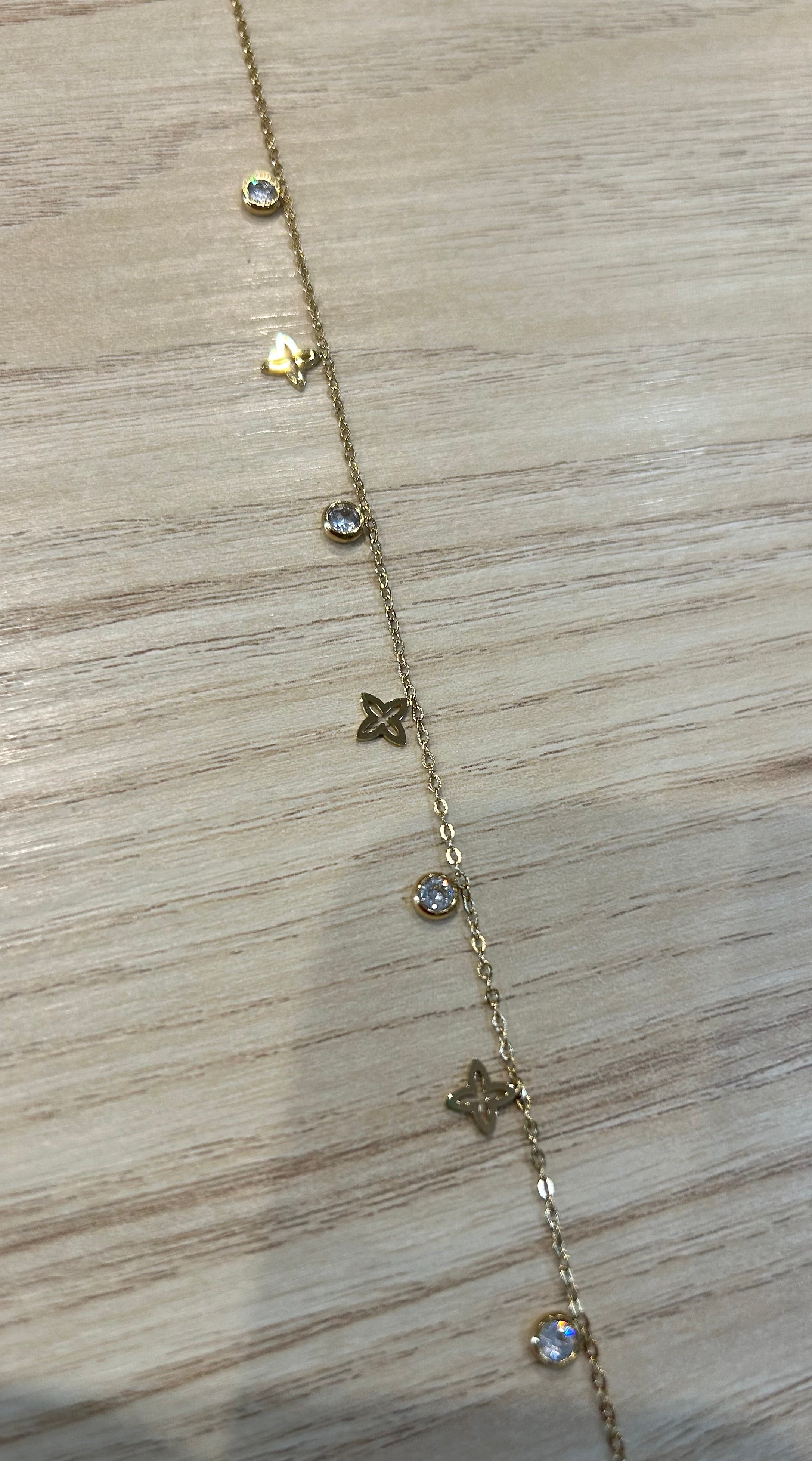 Bracelet pour cheville trèfle et petit strass