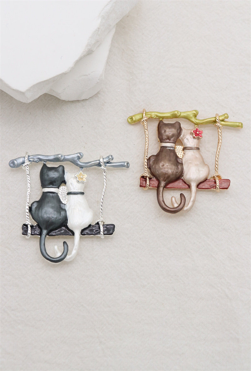 Broche aimantée - Chats balançoire