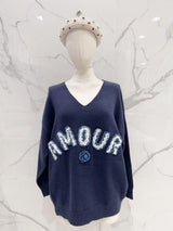 Pull  col V - AMOUR