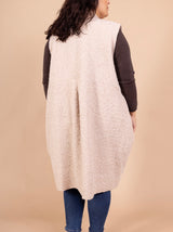 Veste longue sans manches en bouclette