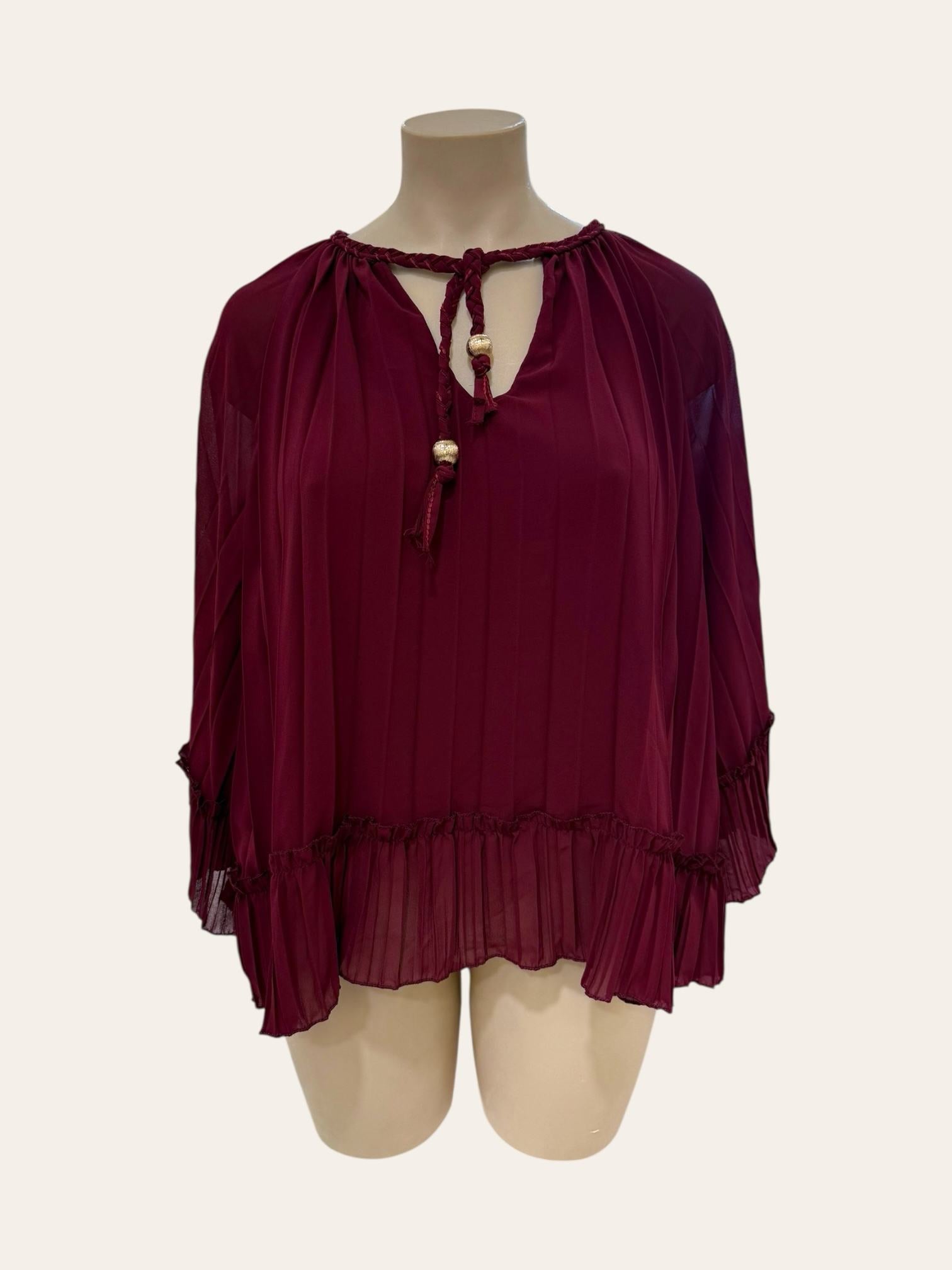 Blouse voilage plissé avec lien tressé