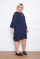 Robe en voilage plissée