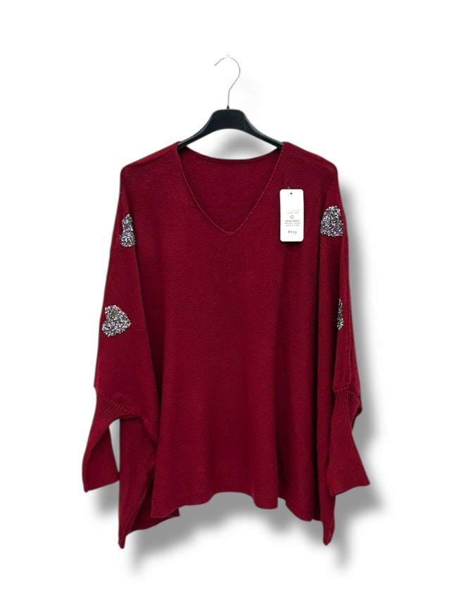 Pull oversize avec cœurs strass sur les manches
