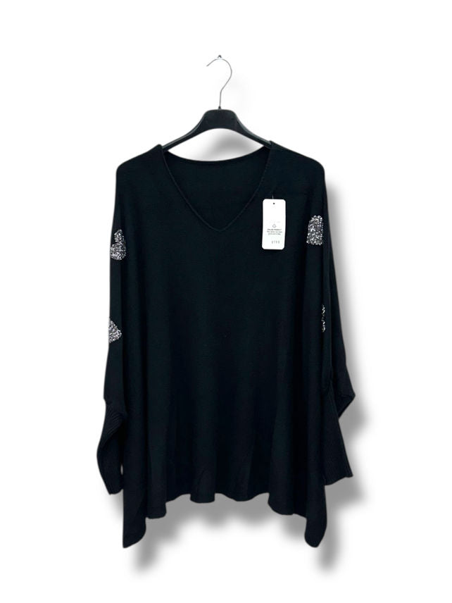Pull oversize avec cœurs strass sur les manches