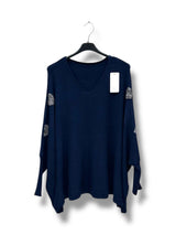 Pull oversize avec cœurs strass sur les manches
