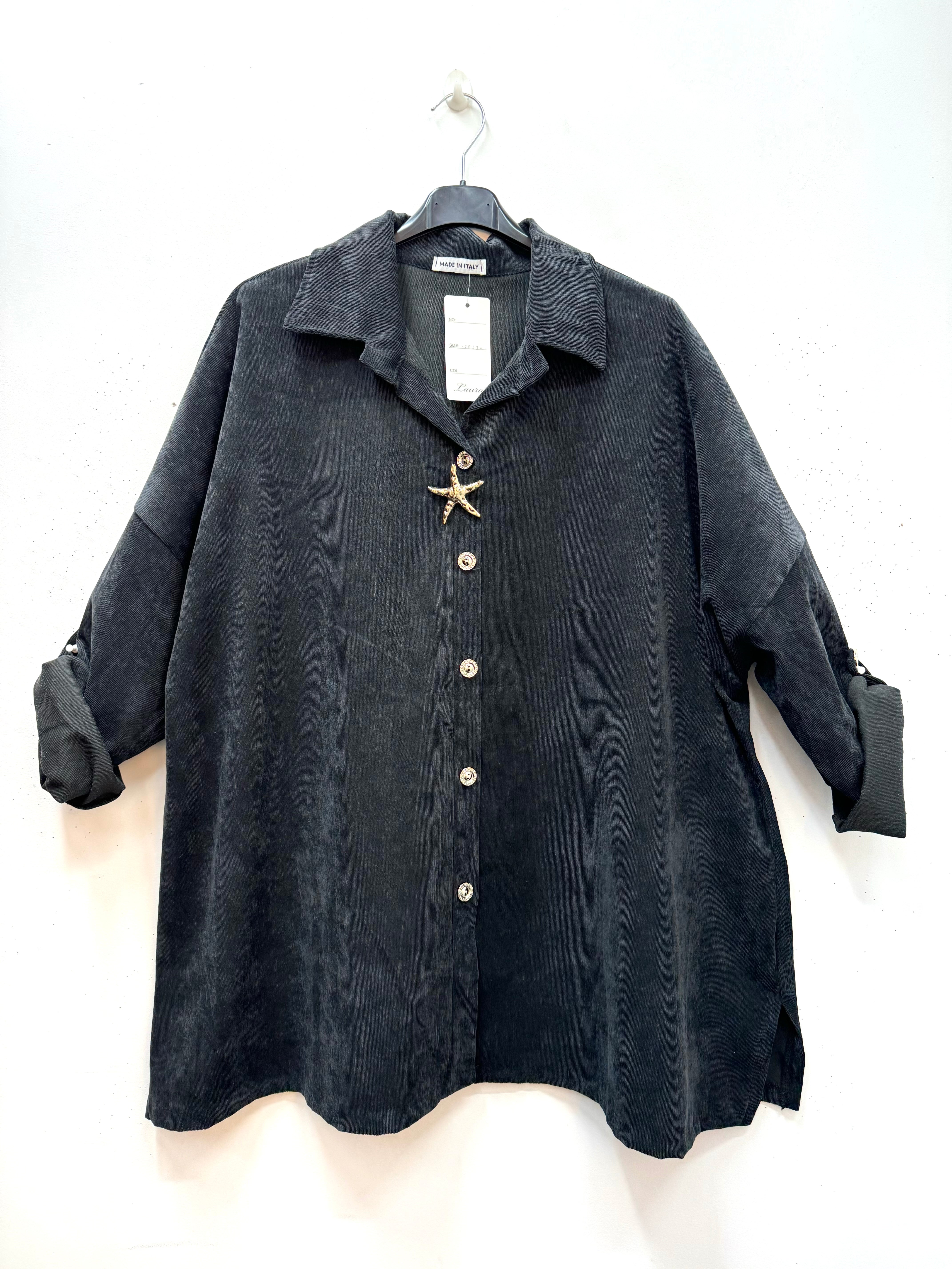 Chemise en velours avec broche