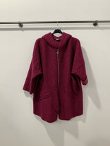 Manteau à capuche en laine bouclée