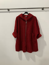 Manteau à capuche en laine bouclée