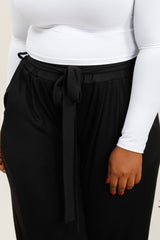 Pantalon noir texturé avec nœud à la taille