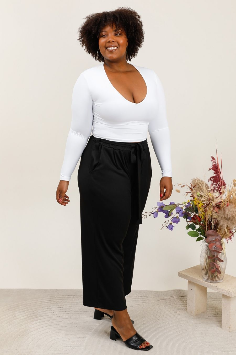 Pantalon noir texturé avec nœud à la taille