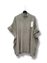 Poncho col montant