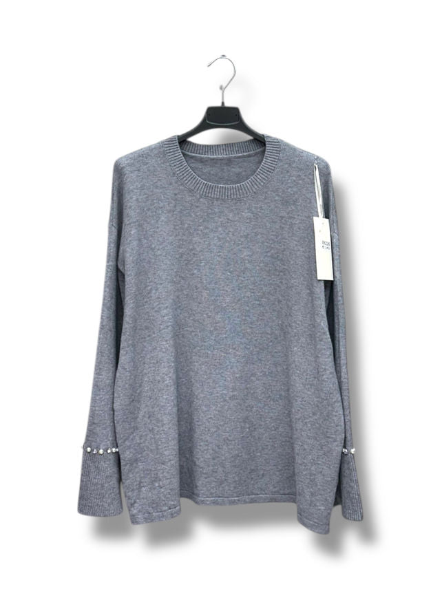 Pull col rond avec strass et perles aux poignets