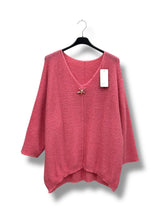 Pull brillant col V étoile