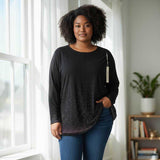 Pull avec pluie de strass