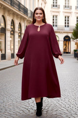 Robe longue avec bouton bijou