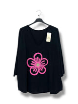 Pull grande fleur floquée