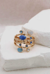 Bague élastiquée - Petites pierres bleues