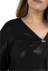 Tunique brillante avec anneaux au col