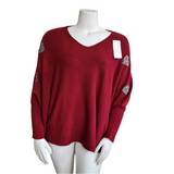 Pull oversize avec cœurs strass sur les manches