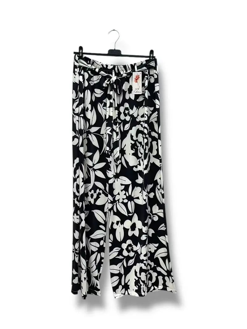 Pantalon à motifs noir et blanc avec ceinture à la taille