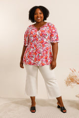 T-shirt imprimé fuchsia et orange avec col ajouré