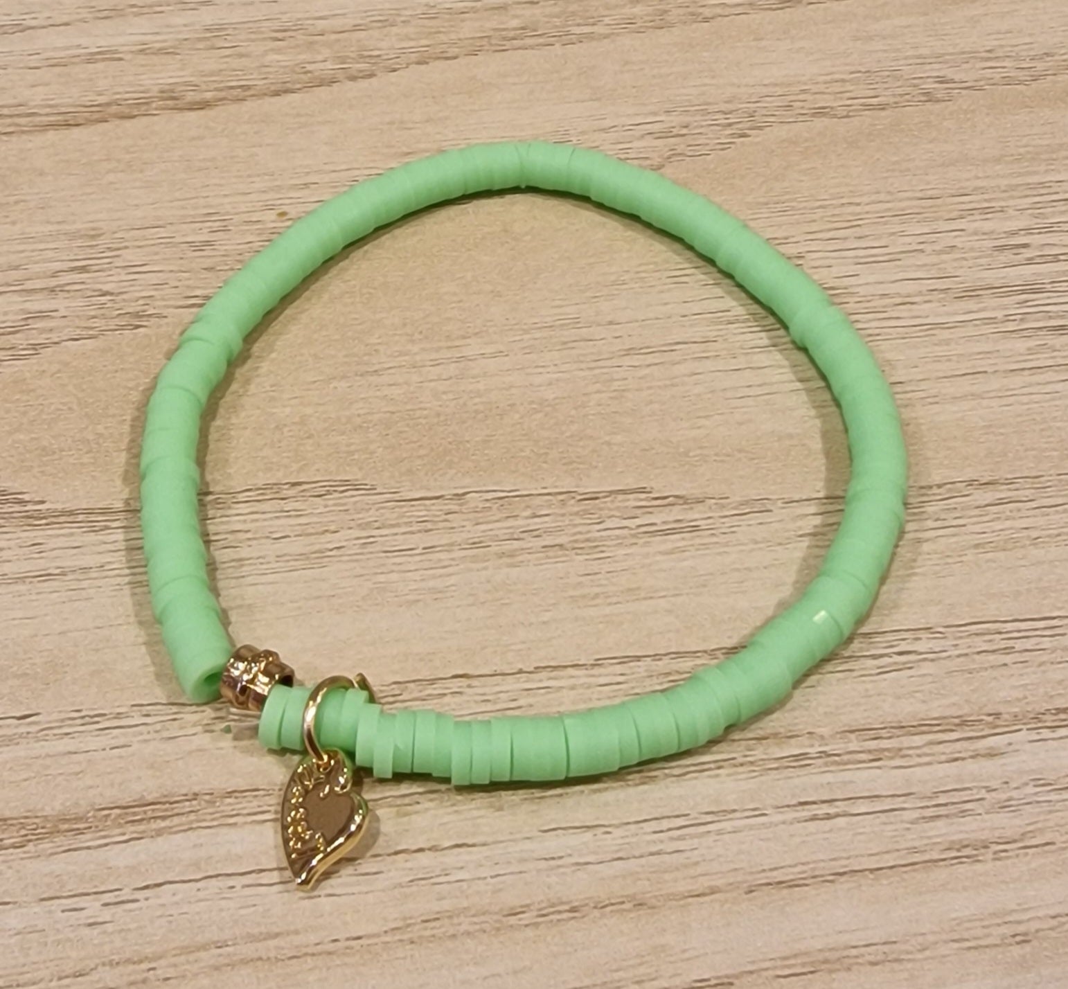 Bracelet élastiqué perles plates en polymère petites - Vert Fluo