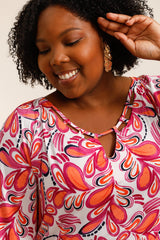 T-shirt imprimé fuchsia et orange avec col ajouré
