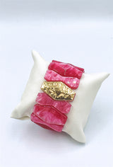 Bracelet élastiqué - Perles en résine et plaque dorée