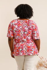 T-shirt imprimé fuchsia et orange avec col ajouré