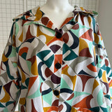 Veste imperméable à capuche - Géométrique