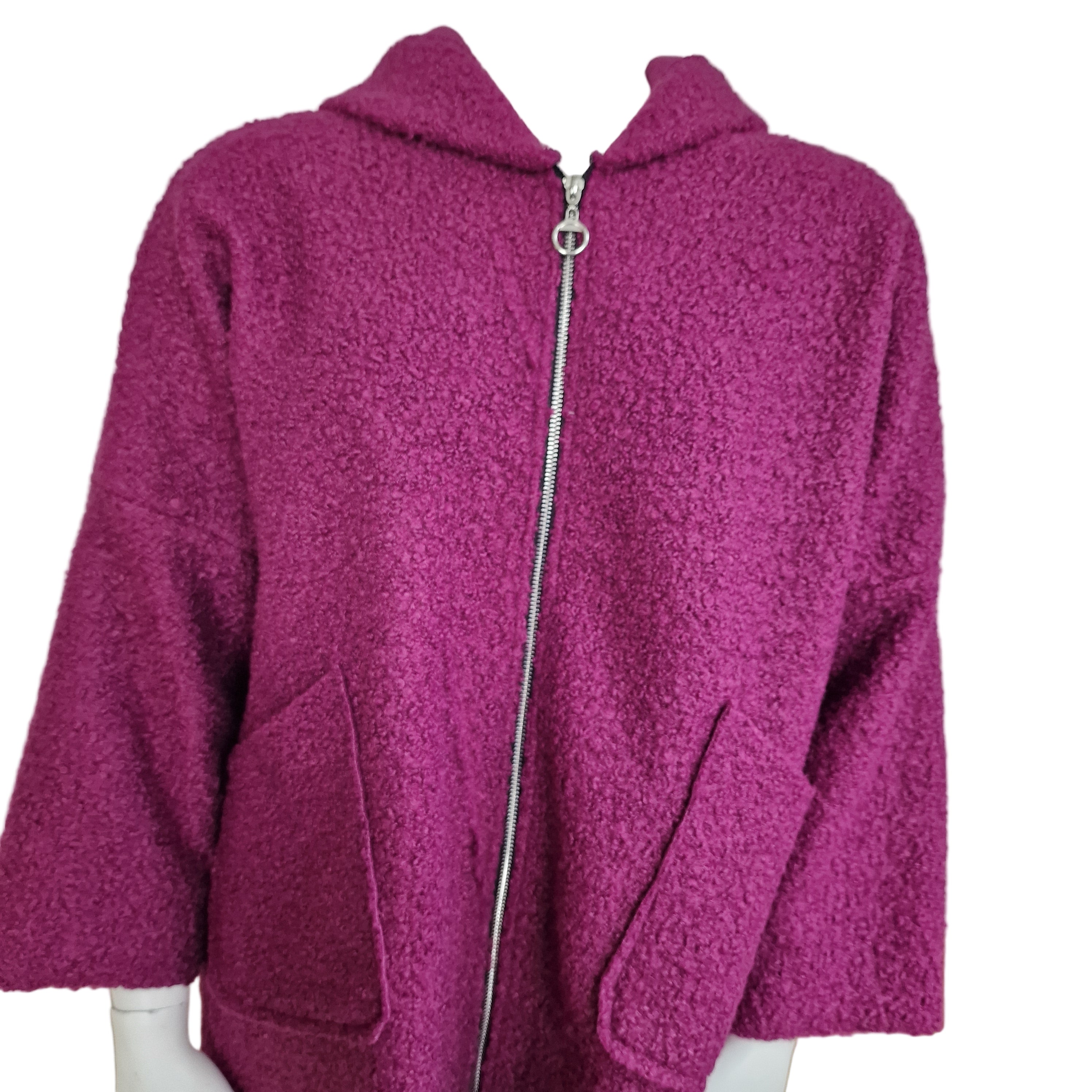 Manteau à capuche en laine bouclée