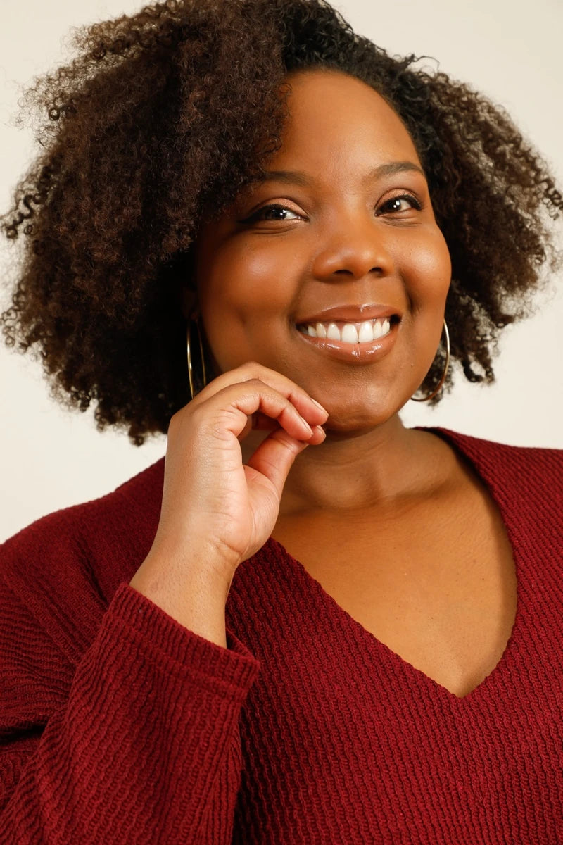 Pull bordeaux texturé avec poche en simili cuir