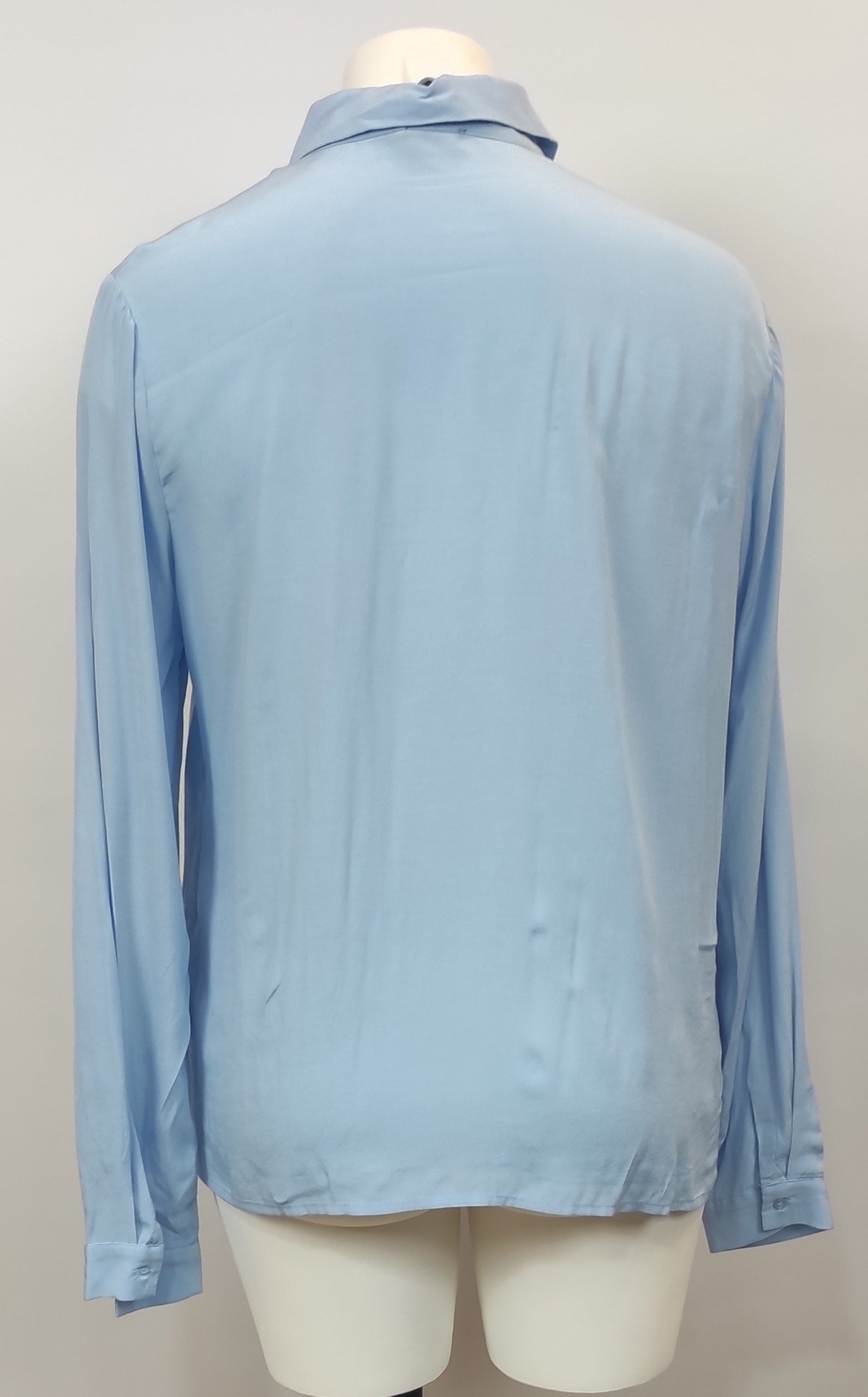 Chemisier bleu ciel avec ligne bleu marine